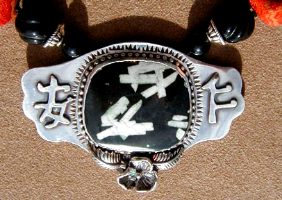 Detail of Peace and Love Necklace
