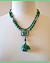 Malachite Bear Necklace on model- Mary Hicklin Malachite Bear Necklace on model